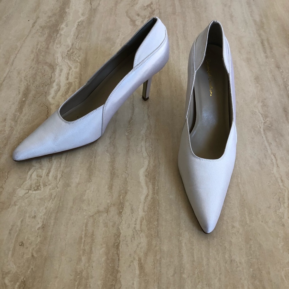 Women’s white satin pumps. Never worn.